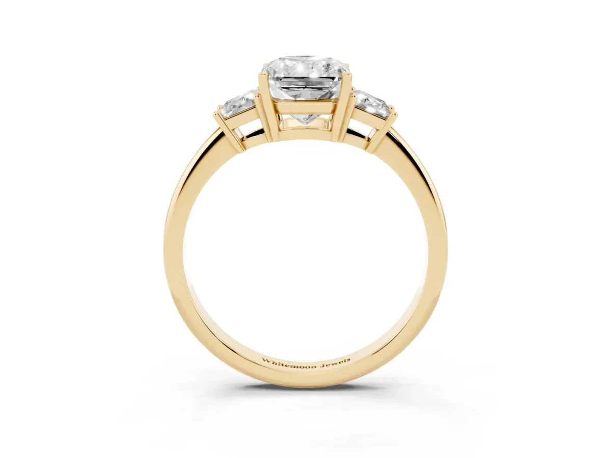 Radiant Cut Diamond Three-Stone Ring with Trapezoid Side Stones and Prong Setting Yellow gold