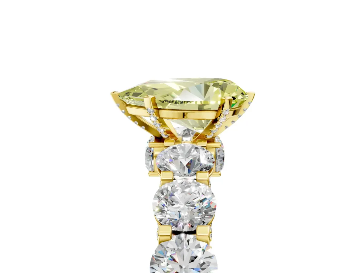 Fancy Yellow Pear Cut Diamond Side Stone Engagement Ring with Four-Prong Setting Yellow gold