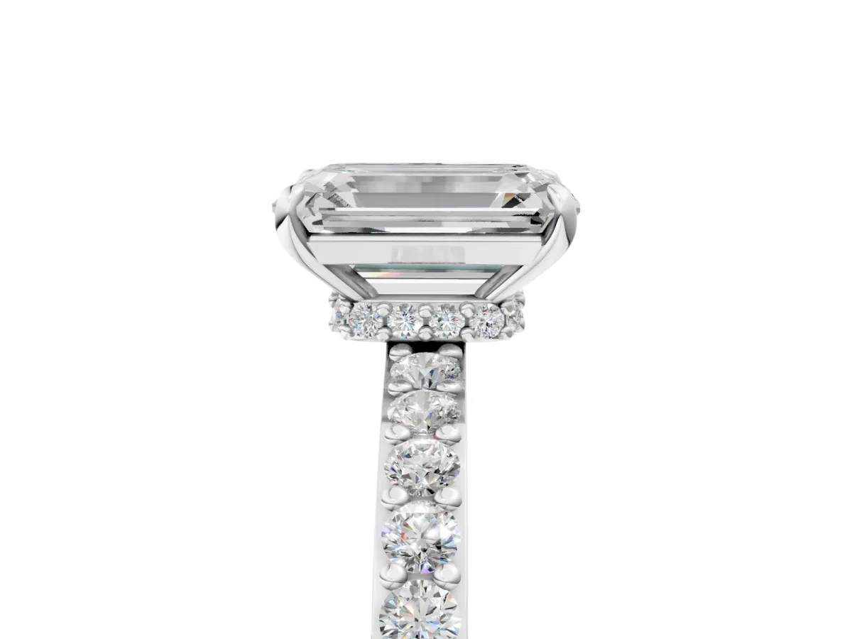 Emerald Cut Diamond Solitaire Engagement Ring with Pavé Band and Four-Prong Setting Silver