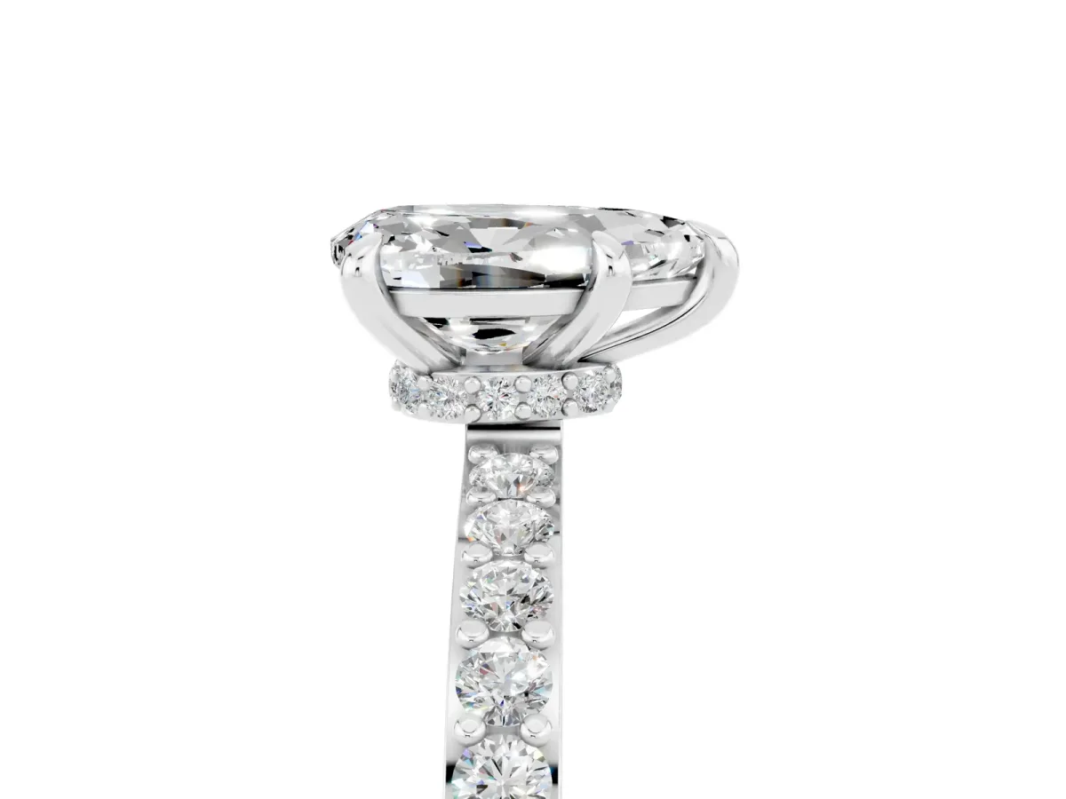 Pear Cut Moissanite Solitaire Engagement Ring with Pavé Band and Four-Prong Setting Silver