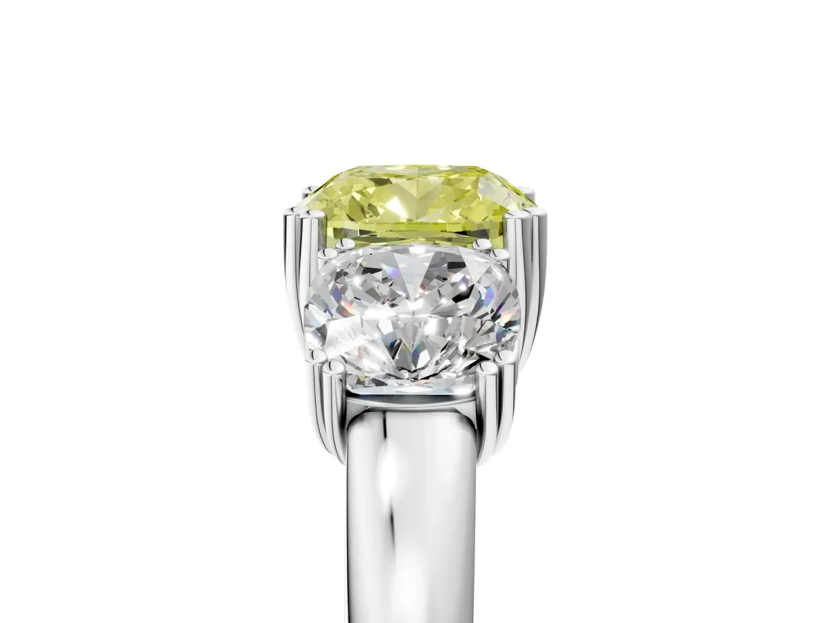 Fancy Yellow Three-Stone Cushion Cut Cut Diamond Ring with Channel Set Band and Four-Prong Setting Silver