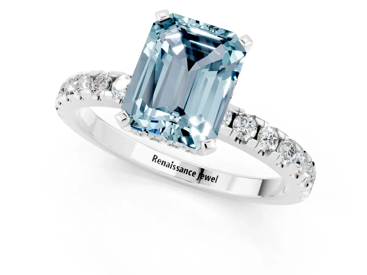Emerald Cut Aquamarine Solitaire Ring with Round Pavé Band and Four-Prong Setting Silver