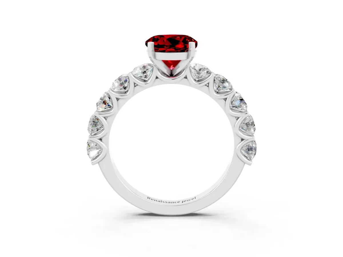 Round Cut Ruby Prong Setting with Side Stones on a Pave Band White gold