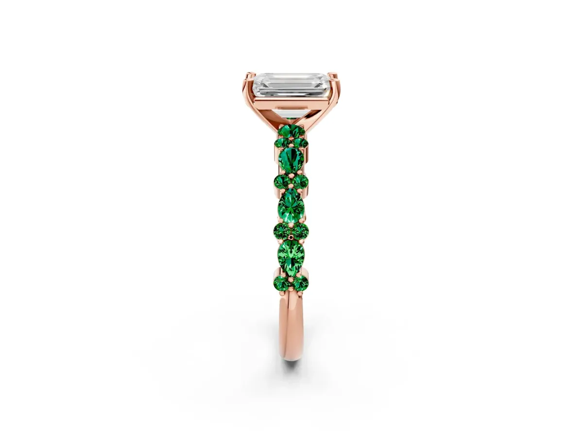 Emerald Cut Diamond Side Stone Solitaire Ring with Round Emerald and Four-Prong Setting Rose gold