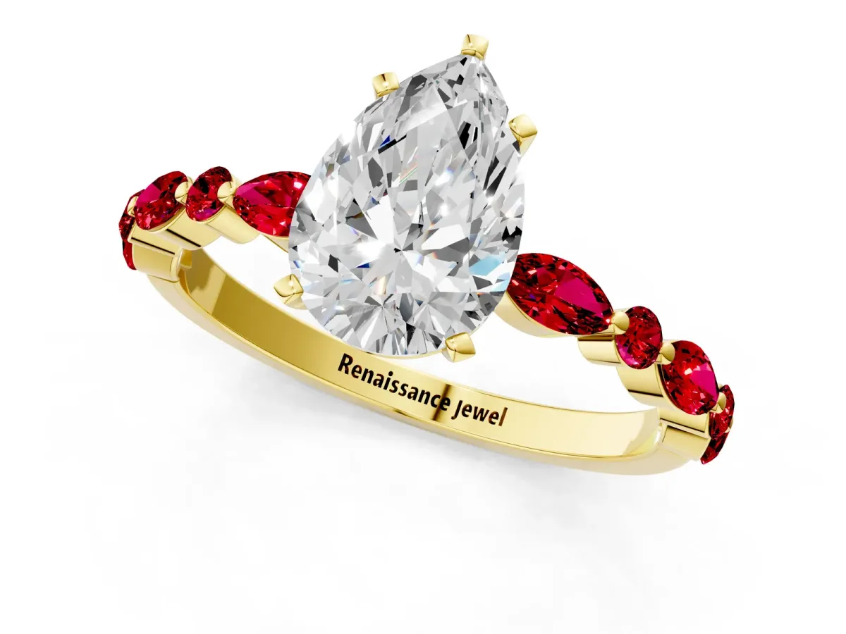 Pear Cut Diamond Ring with Marquise and Round Ruby Side Stones and Four-Prong Setting Yellow gold