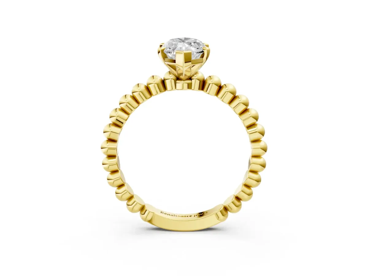 Marquise Cut Diamond Solitaire Ring with Beaded Band and Prong Setting Yellow gold