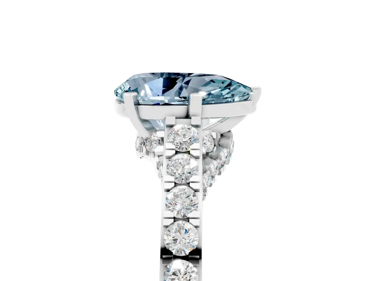 Pear Cut Aquamarine Solitaire Ring with Crossover Gallery and Round Pavé Band Silver