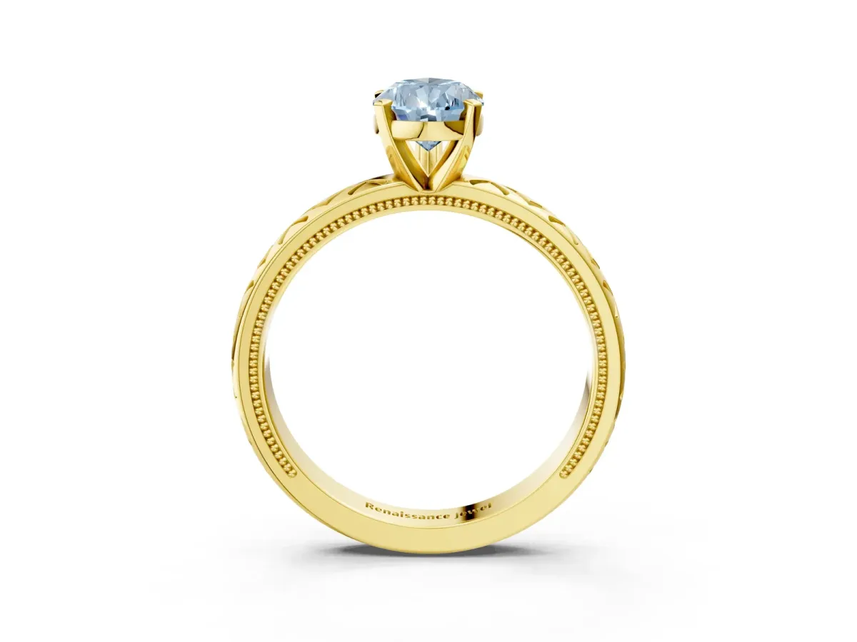 Fancy Blue Pear Cut Solitaire Diamond Ring with Milgrain and Black Enamel X Pattern Band Yellow gold