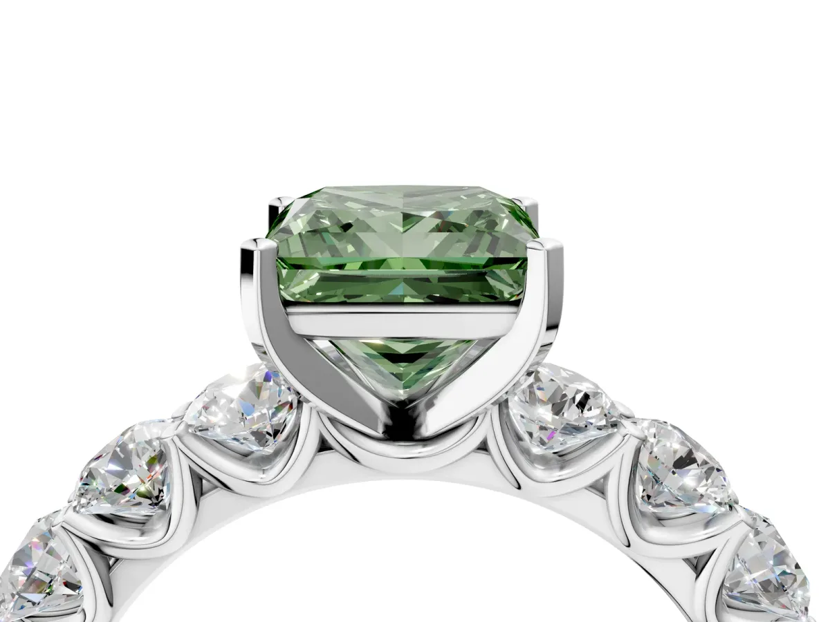 Fancy Green Princess Cut Diamond Prong Setting with Side Stones on a Pave Band Silver