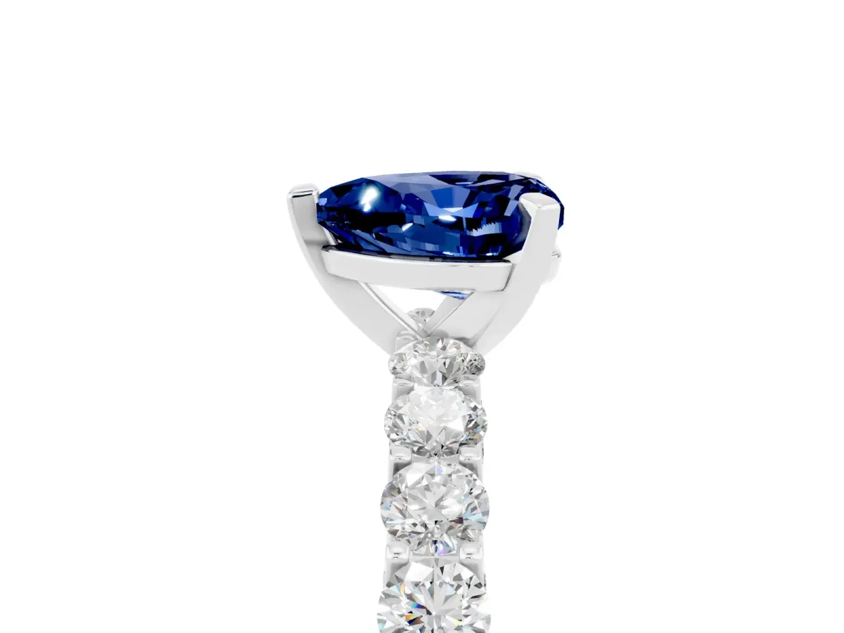 Heart Cut Blue Sapphire Solitaire Ring with Shared Prong Pavé Band and Four-Prong Setting Silver
