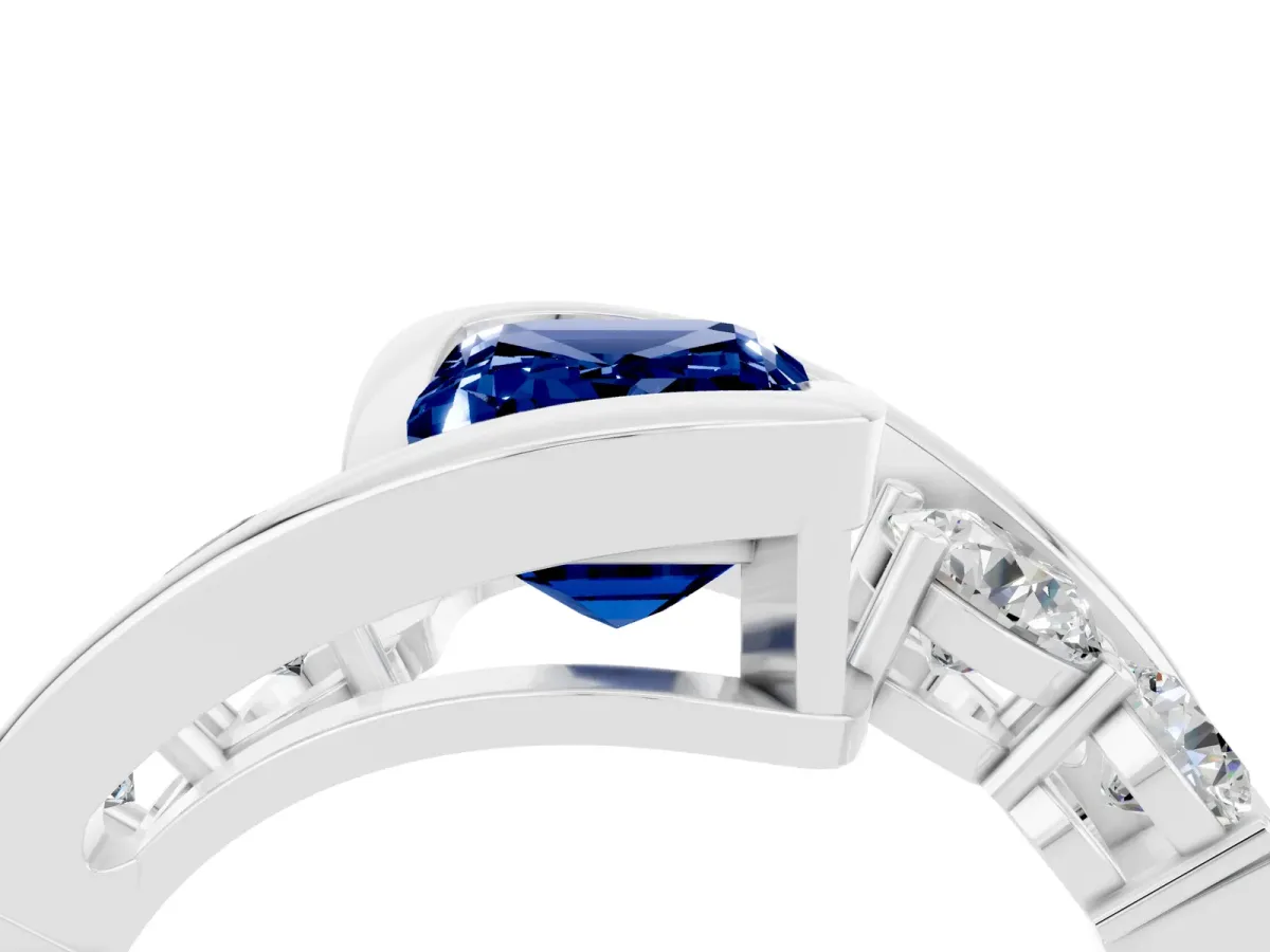 Bezel Set Emerald Cut Blue Sapphire Bypass Ring with Round Accents Platinum