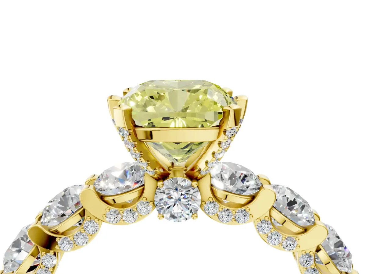 Fancy Yellow Cushion Cut Diamond Side Stone Engagement Ring with Four-Prong Setting Yellow gold