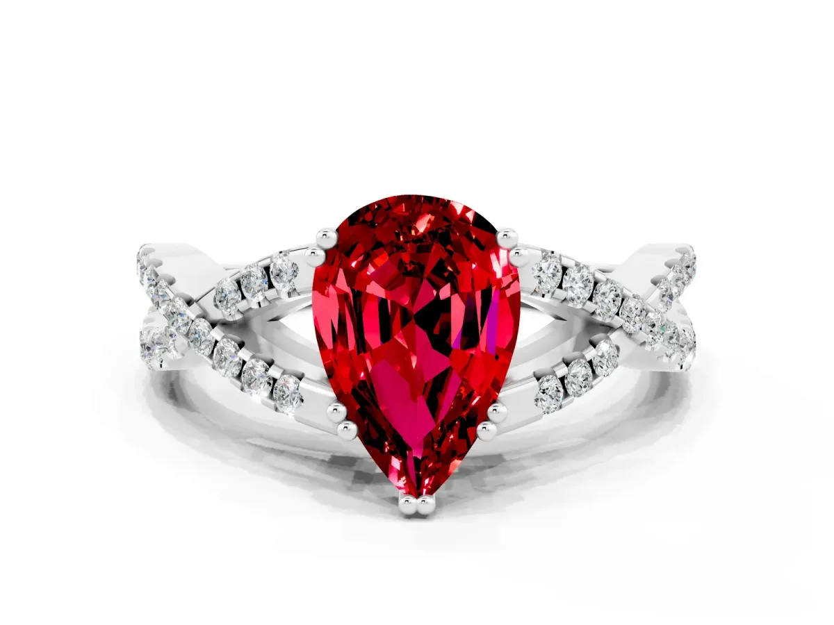 Pear Cut Ruby Solitaire Ring with Four-Prong Setting and Twisted Pavé Band Platinum