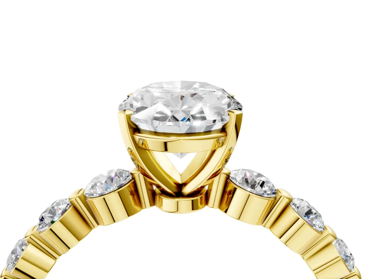 Oval Cut Solitaire Diamond Ring with Pave Band and Four-Prong Setting Yellow gold