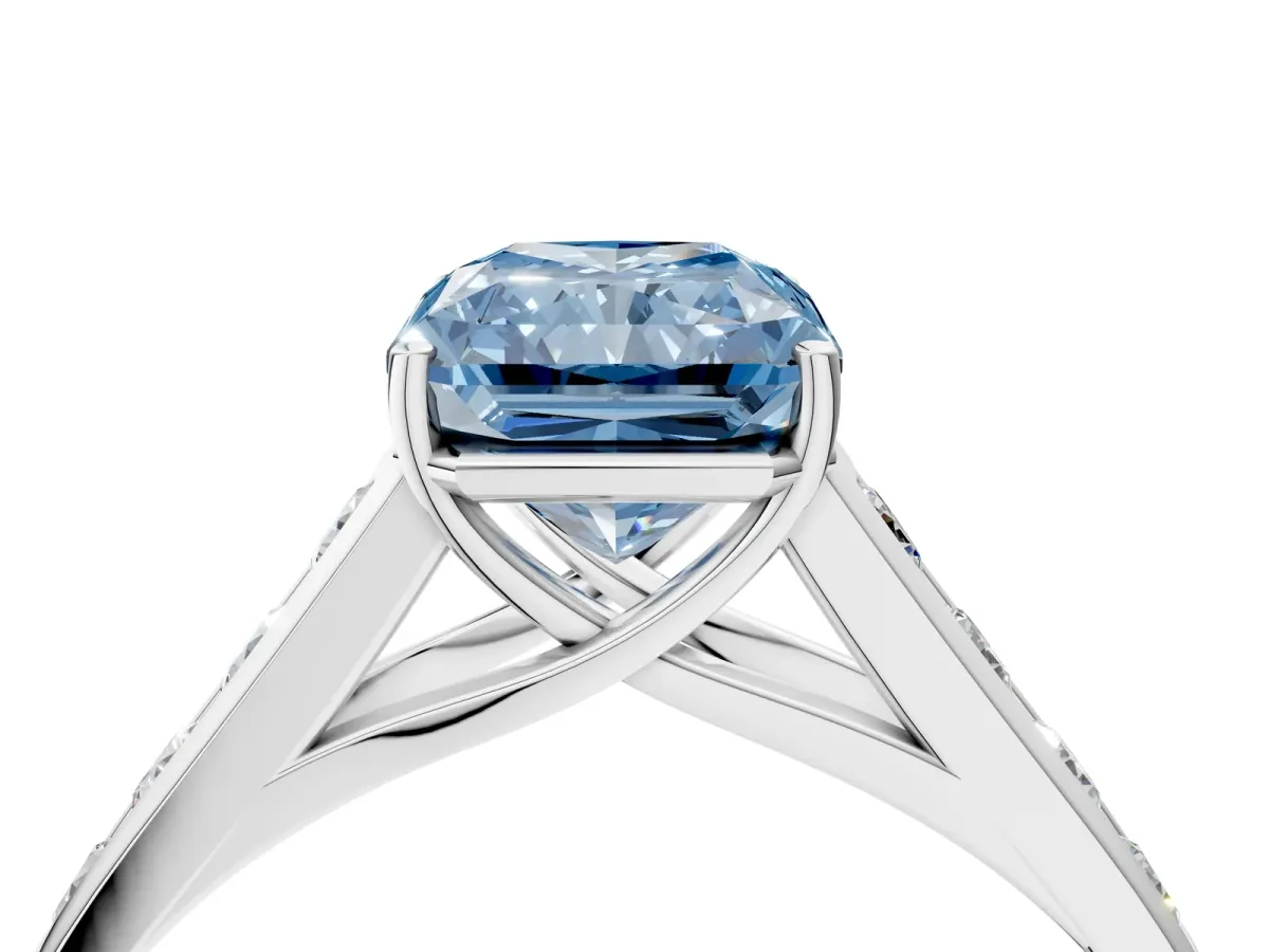 Fancy Blue Radiant Cut Solitaire Channel-Set Diamond Engagement Ring with Four-Prong Setting Platinum