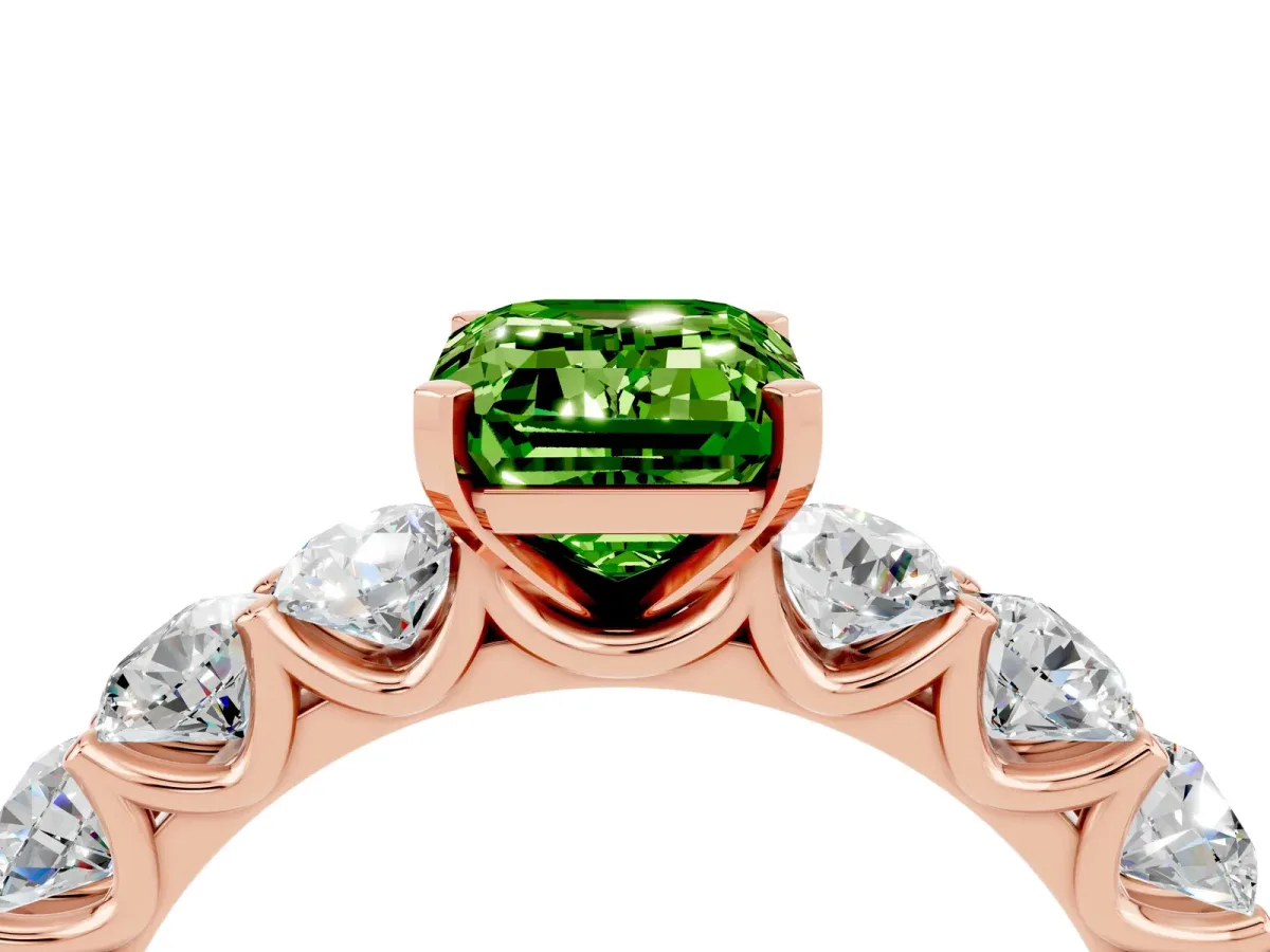 Emerald Cut Peridot Prong Setting with Side Stones on a Pave Band Rose gold