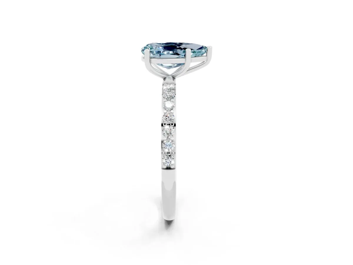 Pear Cut Aquamarine Solitaire Ring with Round Pavé Band and Prong Setting Silver