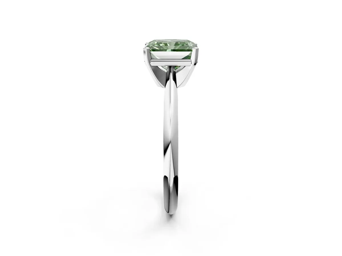 Fancy Green Radiant Cut Cut Solitaire Ring with Four-Prong Setting on a Classic Band Platinum