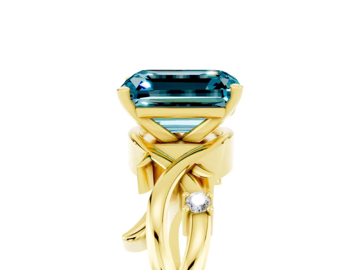 Emerald Cut Blue Topaz Solitaire Ring with Twisted Band and Prong Setting Yellow gold