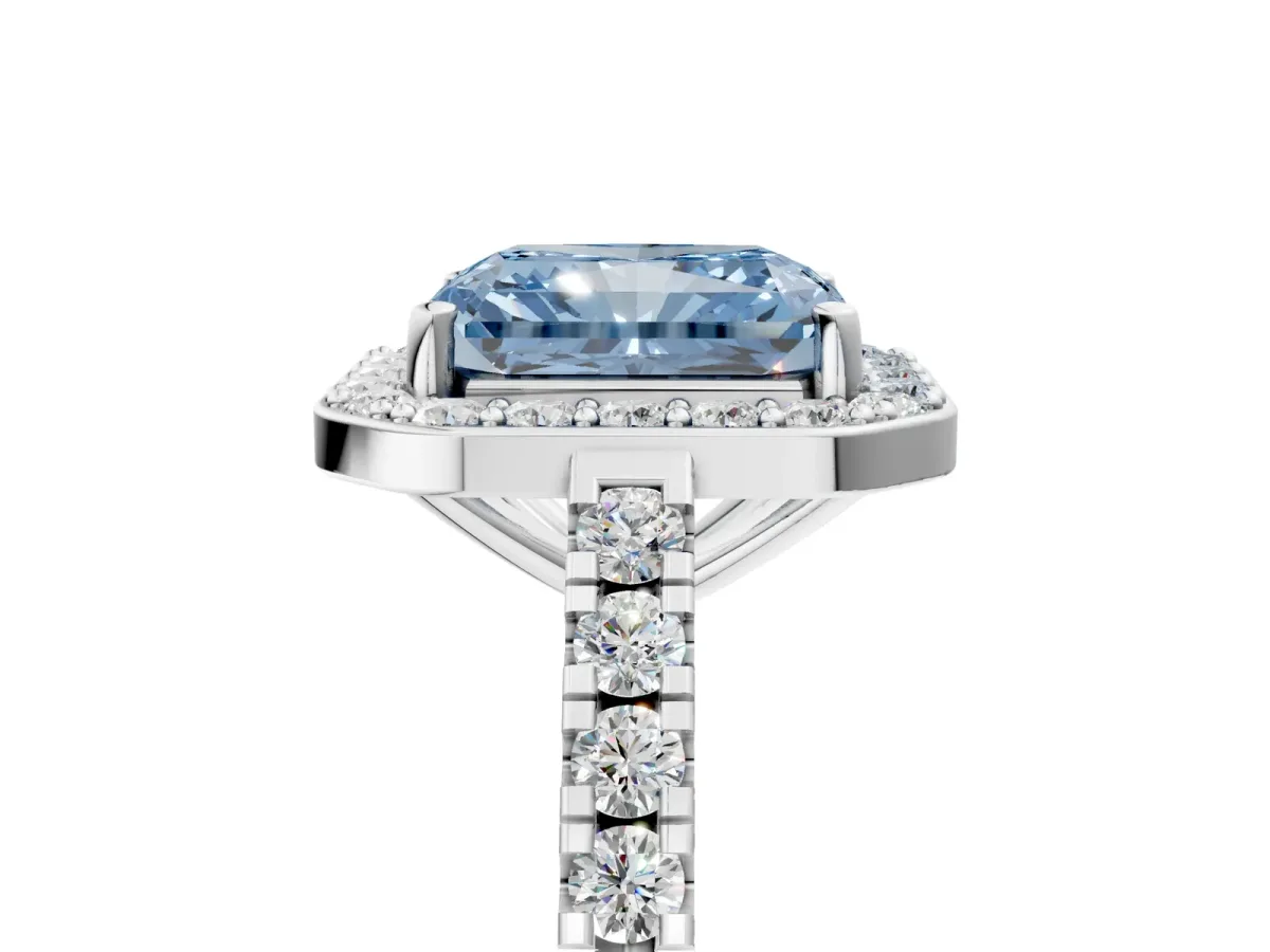 Fancy Blue Radiant Cut Diamond Halo Ring with Round Pavé Split Shank and Prong Setting Platinum