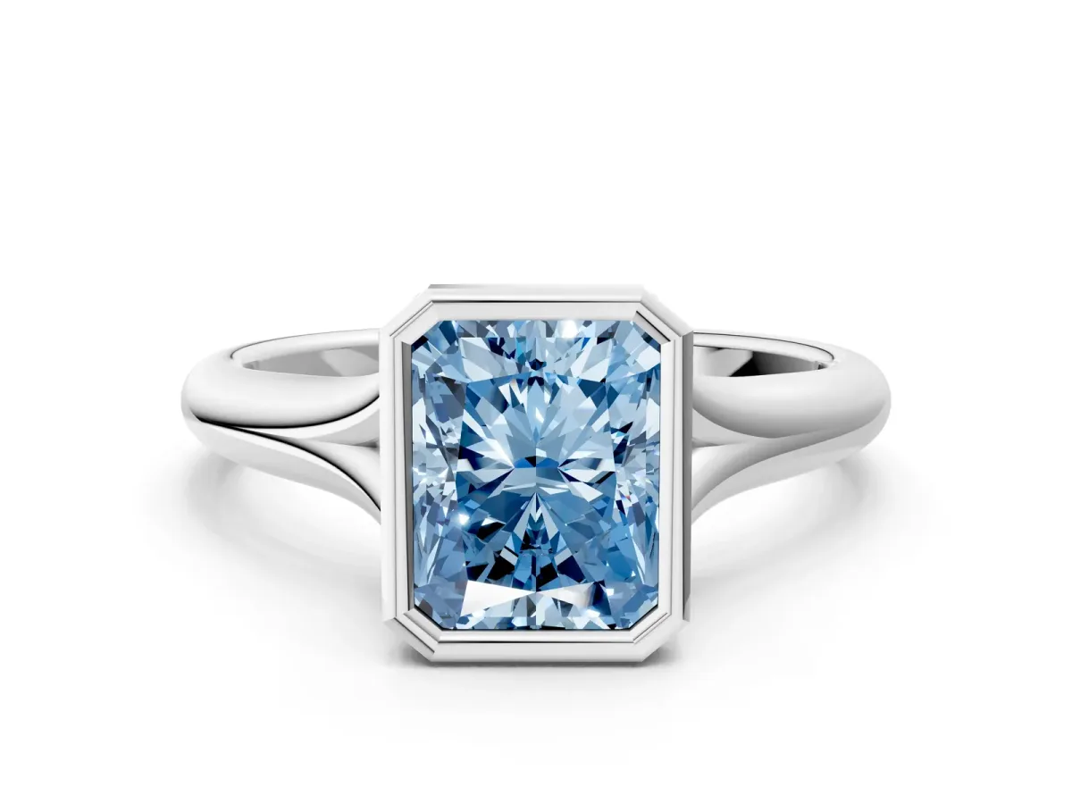 Fancy Blue Bezel Set Radiant Cut Solitaire Diamond Ring with Smooth Band Platinum