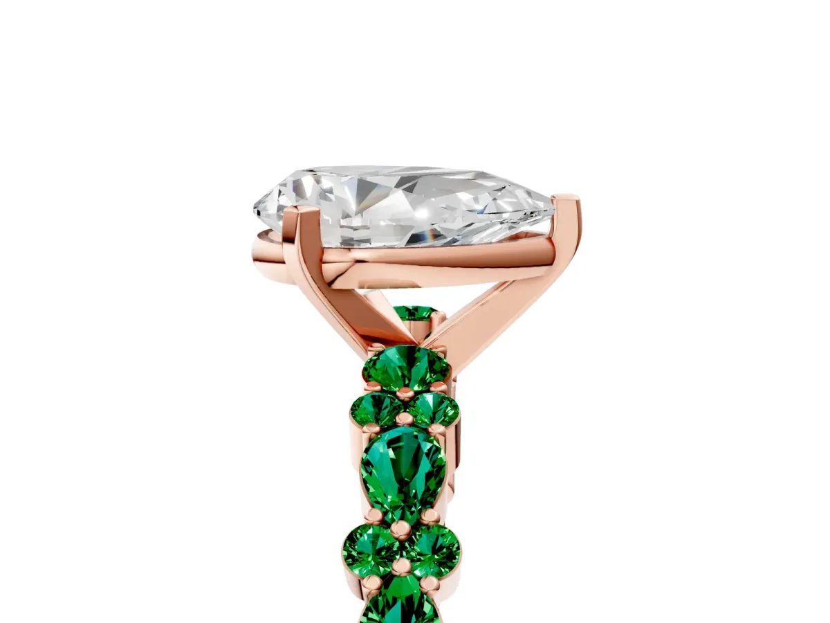 Pear Cut Diamond Side Stone Solitaire Ring with Round Emerald and Four-Prong Setting Rose gold
