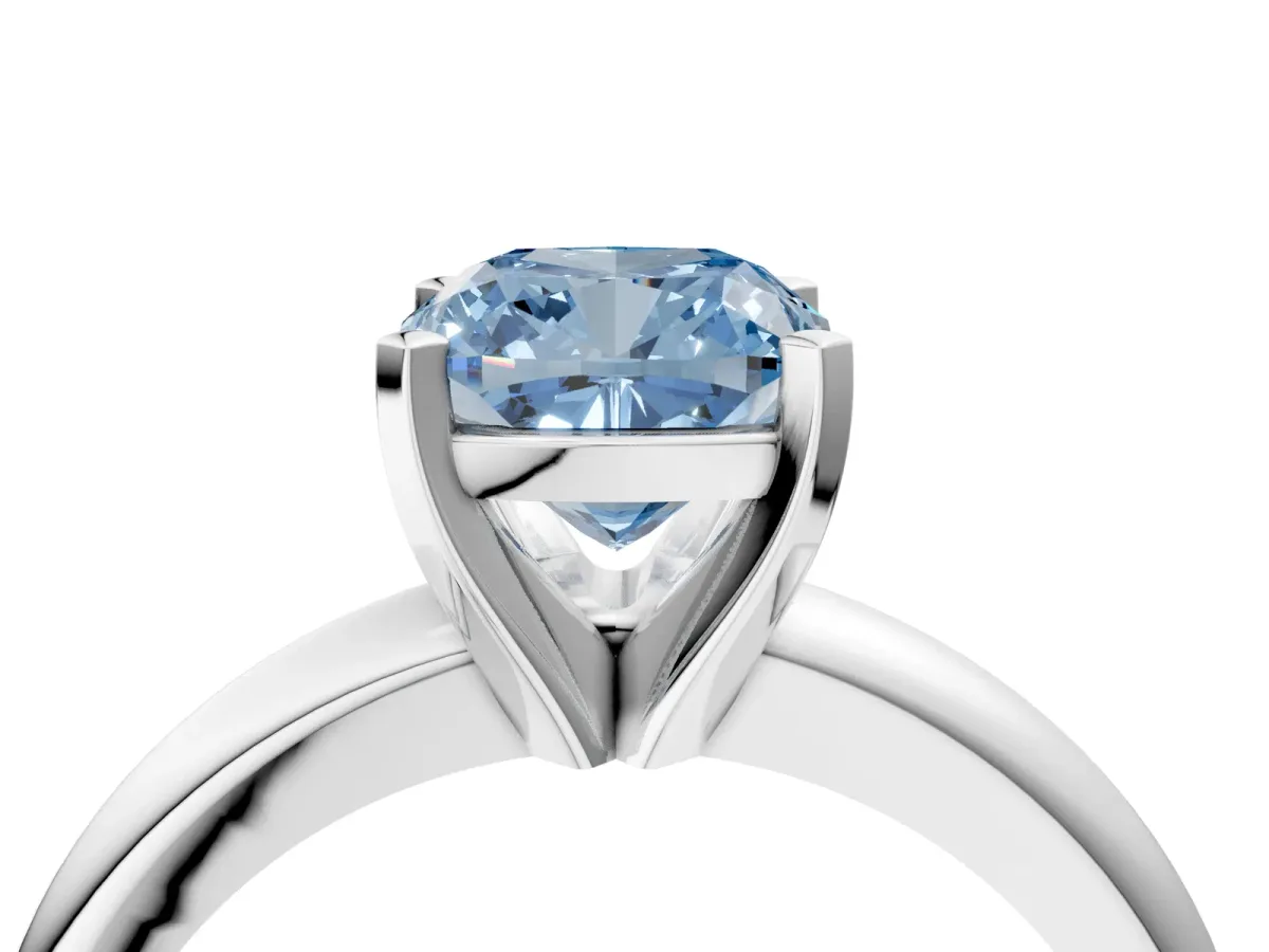 Fancy Blue Cushion Cut Diamond Solitaire Engagement Ring with Round Band and Four-Prong Setting Silver