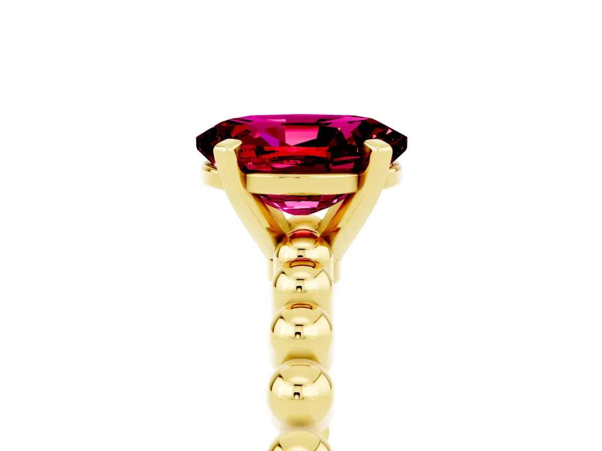 Oval Cut Garnet Solitaire Ring with Beaded Band and Prong Setting Yellow gold