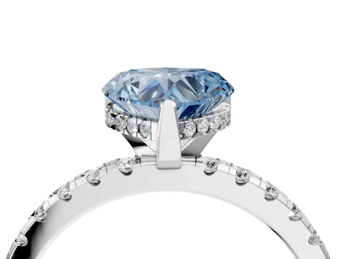 Fancy Blue Heart Cut Diamond Solitaire Ring with Round Pavé Band and Four-Prong Setting Silver
