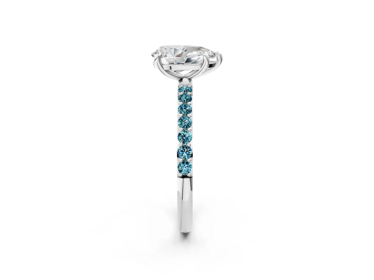Pear Cut Diamond Solitaire Ring with Round Blue Topaz Pavé Band and Prong Setting Silver