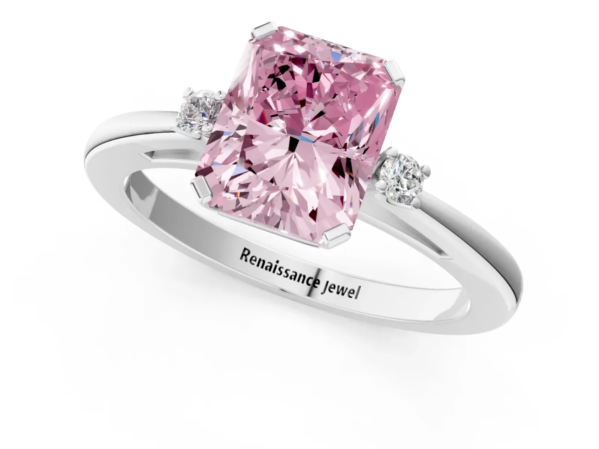 Fancy Pink Radiant Cut Cut Three-Stone Solitaire Ring with Round Accent Diamonds and Four-Prong Setting Platinum