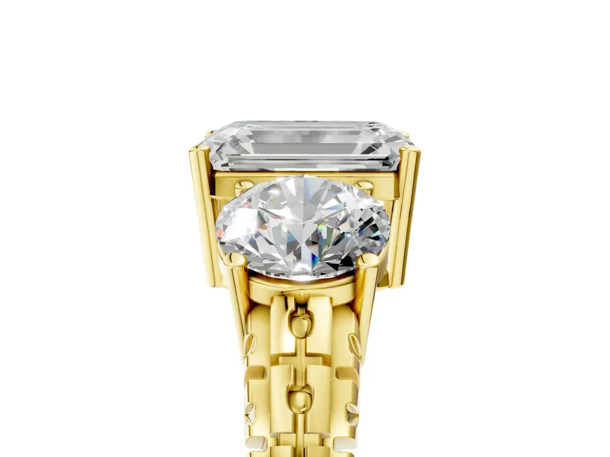 Three-Stone Emerald Cut Cut Diamond Ring with Channel-Set Band and Prong Setting Yellow gold
