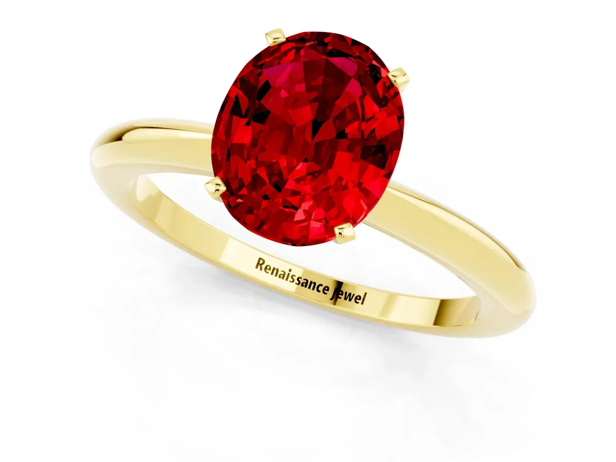 Oval Cut Ruby Solitaire Ring with Six-Prong Setting and Classic Band Yellow gold