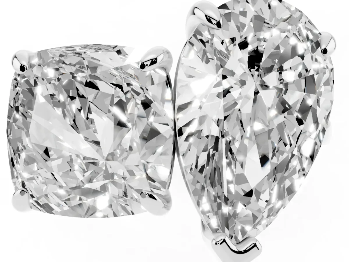 Pear and Cushion Toi Moi Ring with Prong Setting and Plain Band Silver