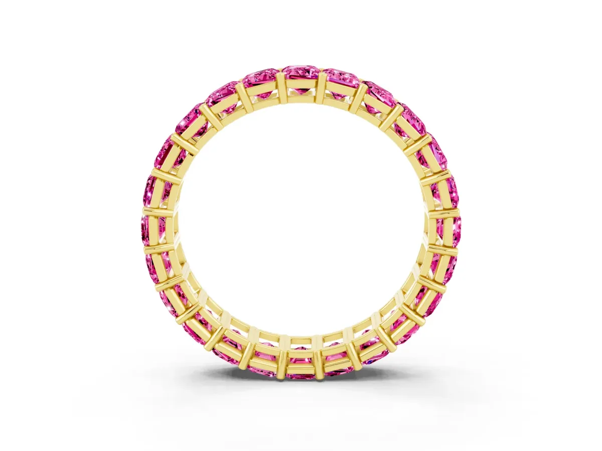 Emerald Cut Pink Sapphire Eternity Band with Shared Prong Setting Yellow gold
