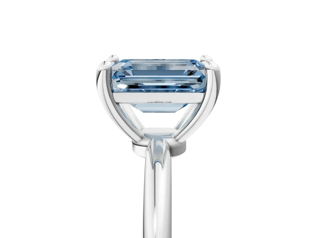 Fancy Blue Emerald Cut Solitaire Diamond Ring with 4-Prong Setting on a Classic Band Silver