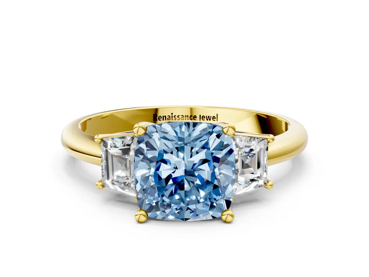 Fancy Blue Cushion Cut Diamond Three-Stone Ring with Trapezoid Side Stones and Prong Setting Yellow gold