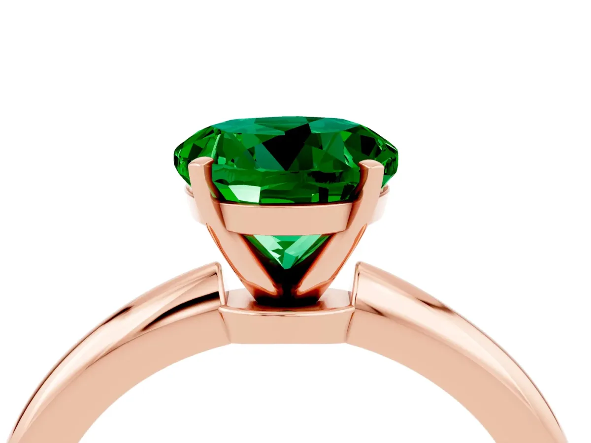 Round Cut Emerald Solitaire Ring with Six-Prong Setting and Classic Band Rose gold