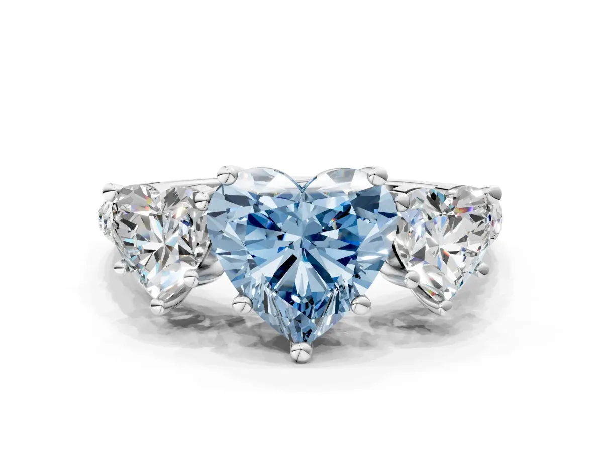 Fancy Blue Three-Stone Heart Cut Diamond Ring with Round Pavé Band and Prong Setting Silver