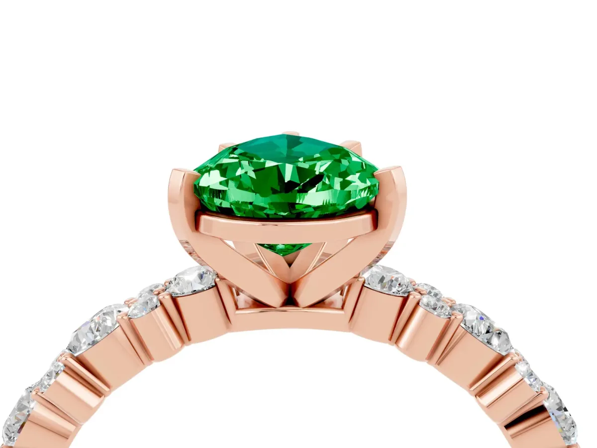 Pear Cut Emerald Side Stone Solitaire Ring with Round and Four-Prong Setting Rose gold