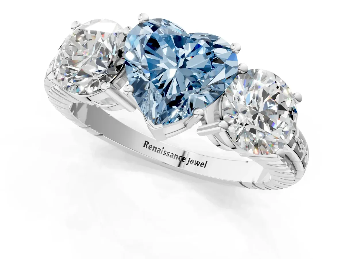 Fancy Blue Three-Stone Heart Cut Cut Diamond Ring with Channel-Set Band and Prong Setting Platinum