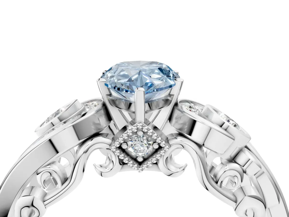 Fancy Blue Pear Cut Diamond Solitaire Ring with Milgrain Pavé Band and Four-Prong Setting Silver