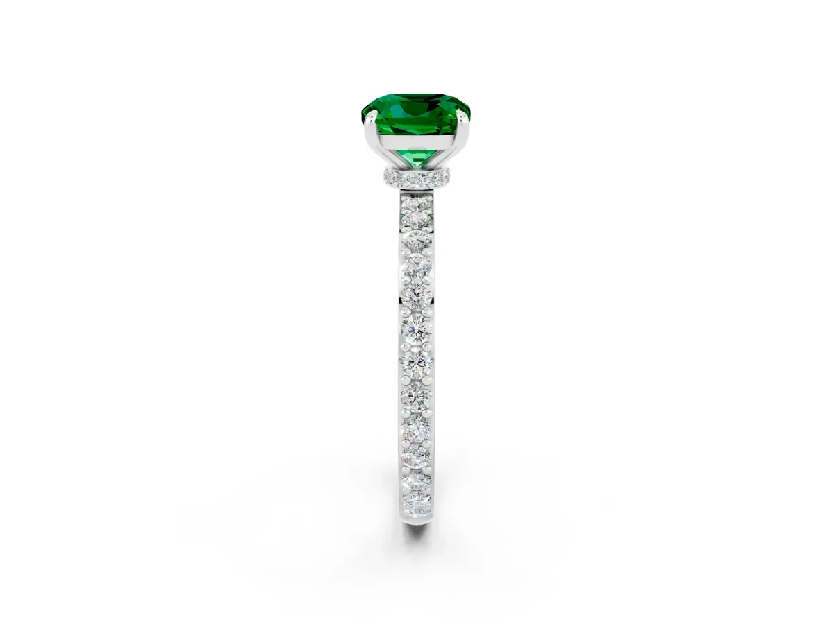 Cushion Cut Emerald Solitaire Engagement Ring with Pavé Band and Four-Prong Setting Silver