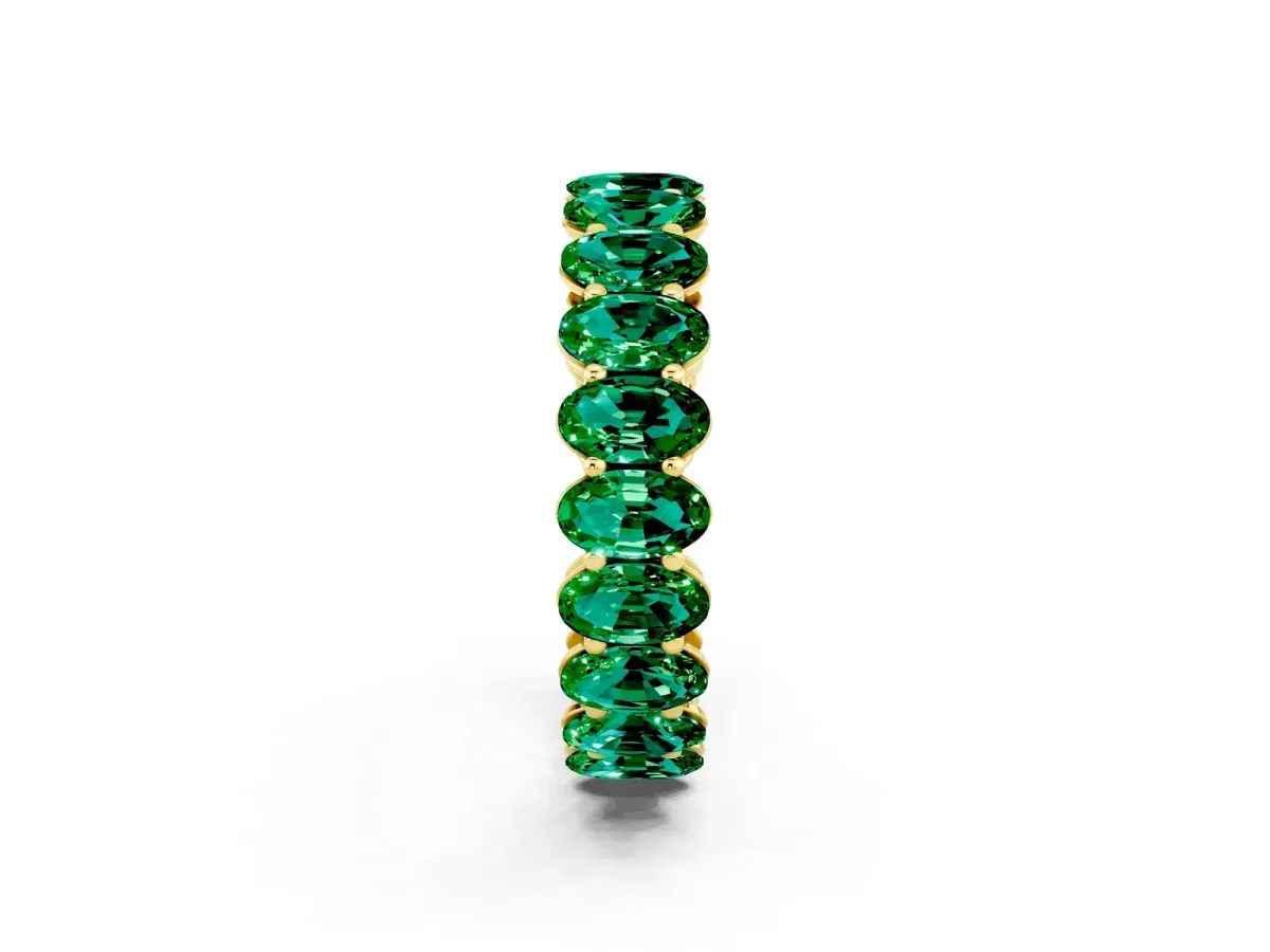 Oval Cut Emerald Eternity Band with Shared Prong Setting Yellow gold
