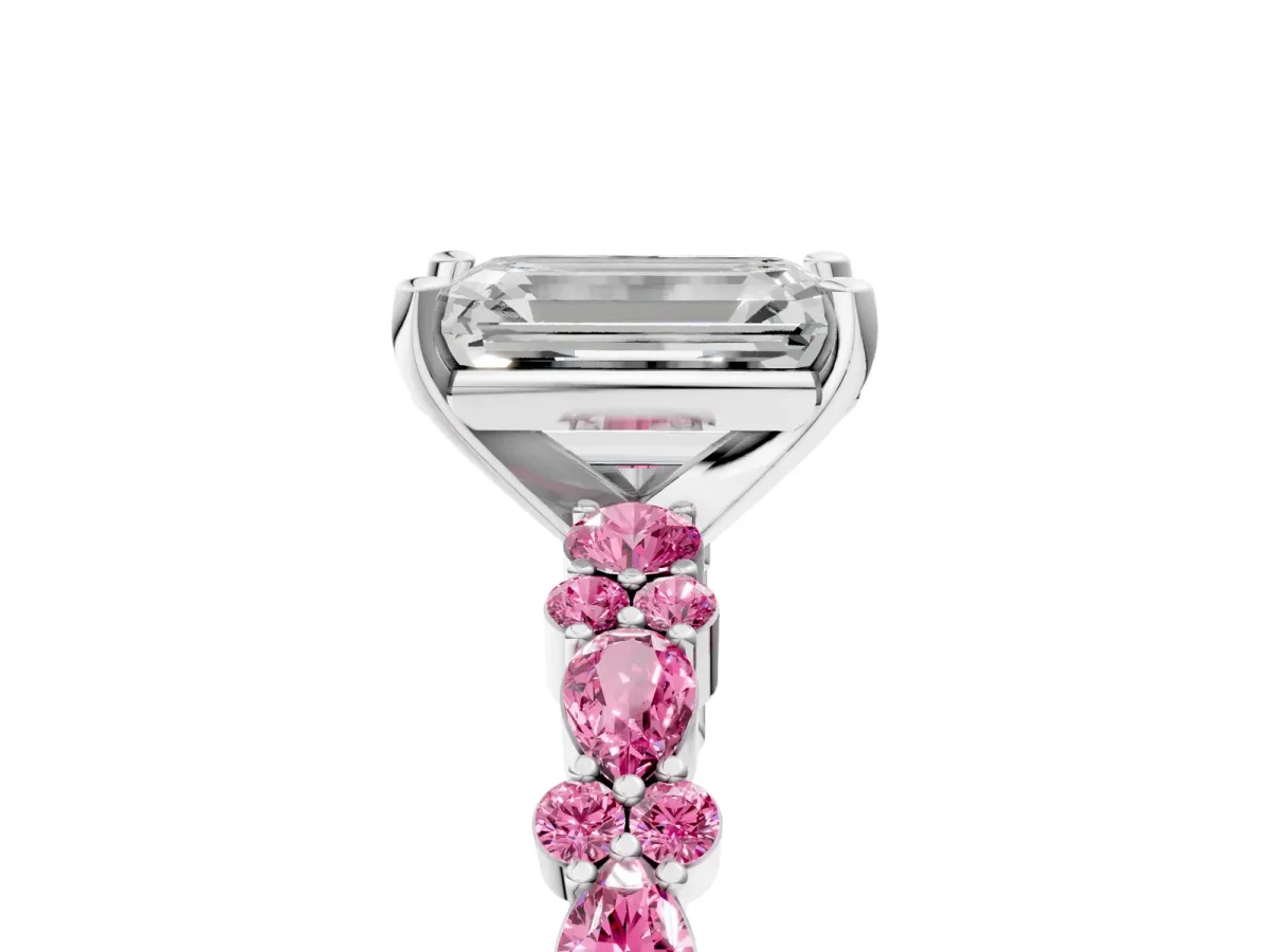 Emerald Cut Diamond Side Stone Solitaire Ring with Round Pink Sapphire and Four-Prong Setting Platinum