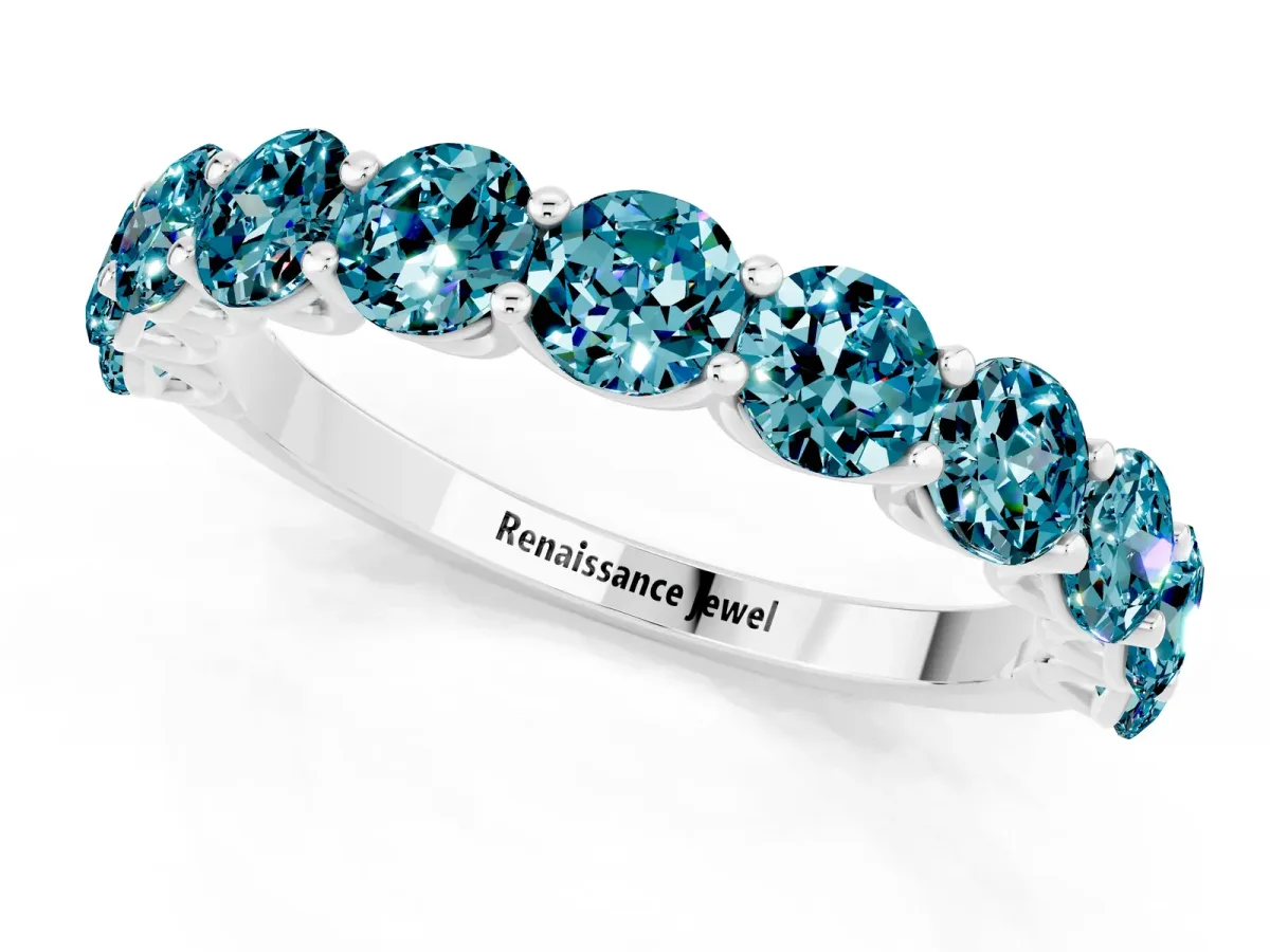Round Blue Topaz Shared Prong Eternity Band Platinum