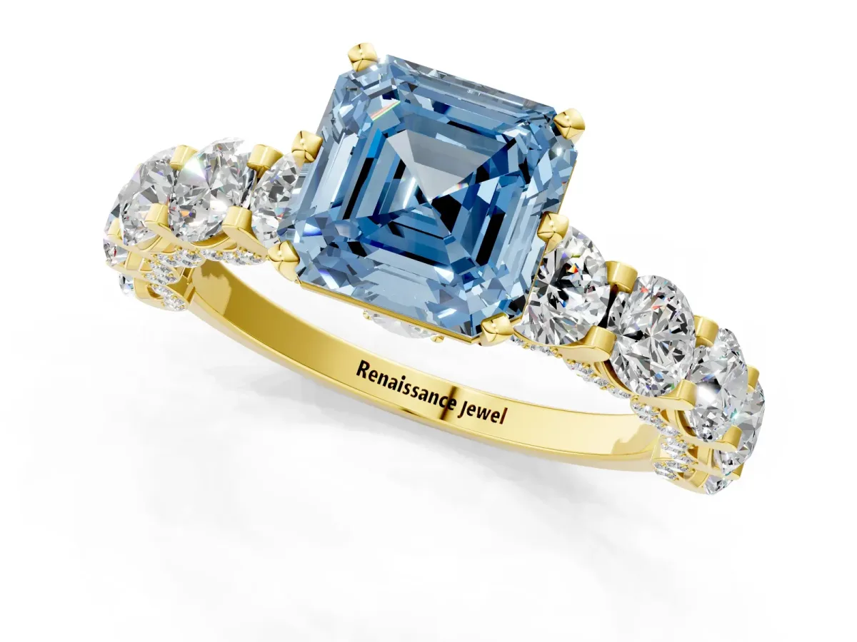 Fancy Blue Asscher Cut Diamond Side Stone Engagement Ring with Four-Prong Setting Yellow gold