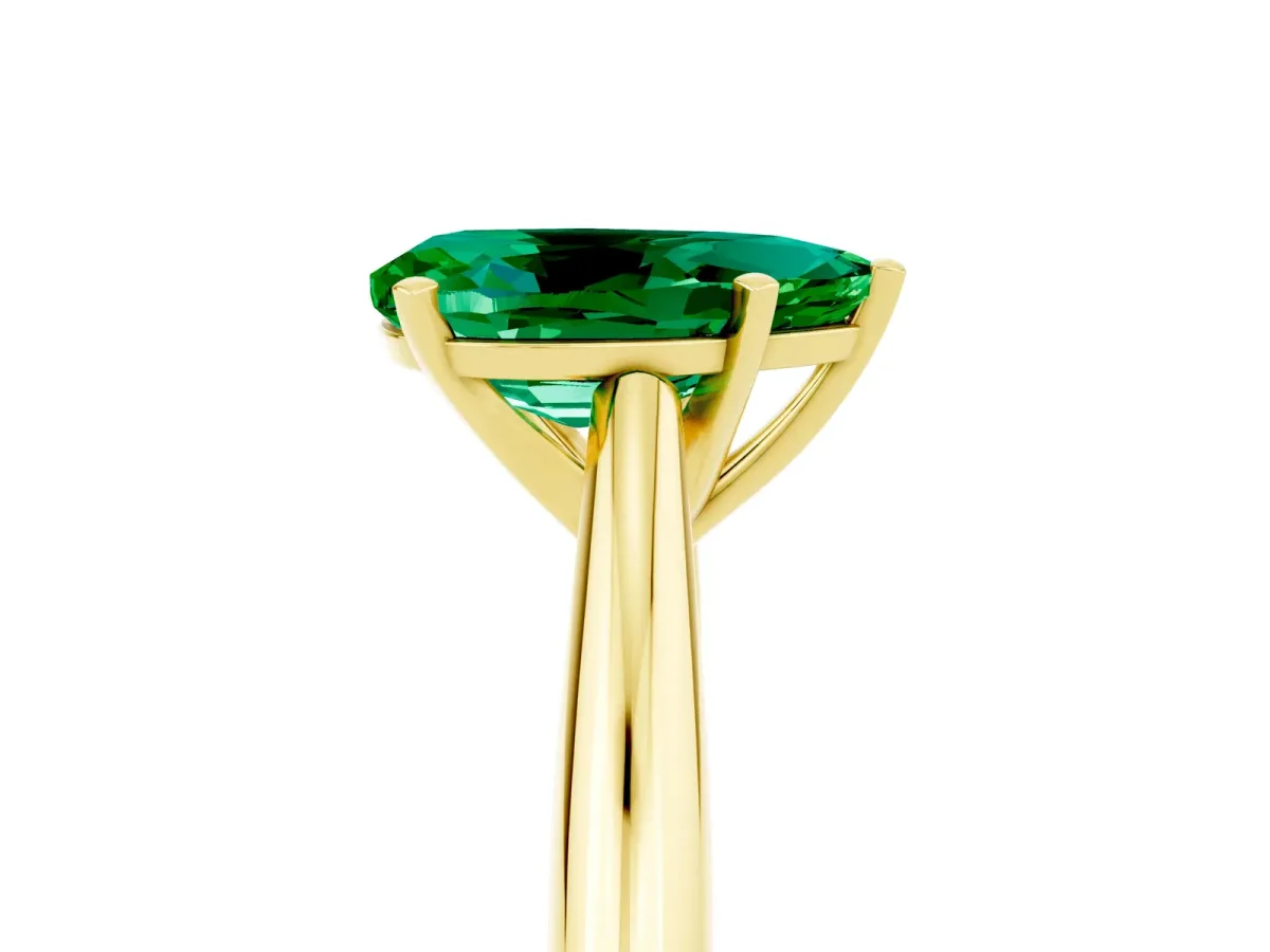 Pear Cut Emerald Solitaire Engagement Ring with Cathedral Setting and Four-Prong Mount Yellow gold