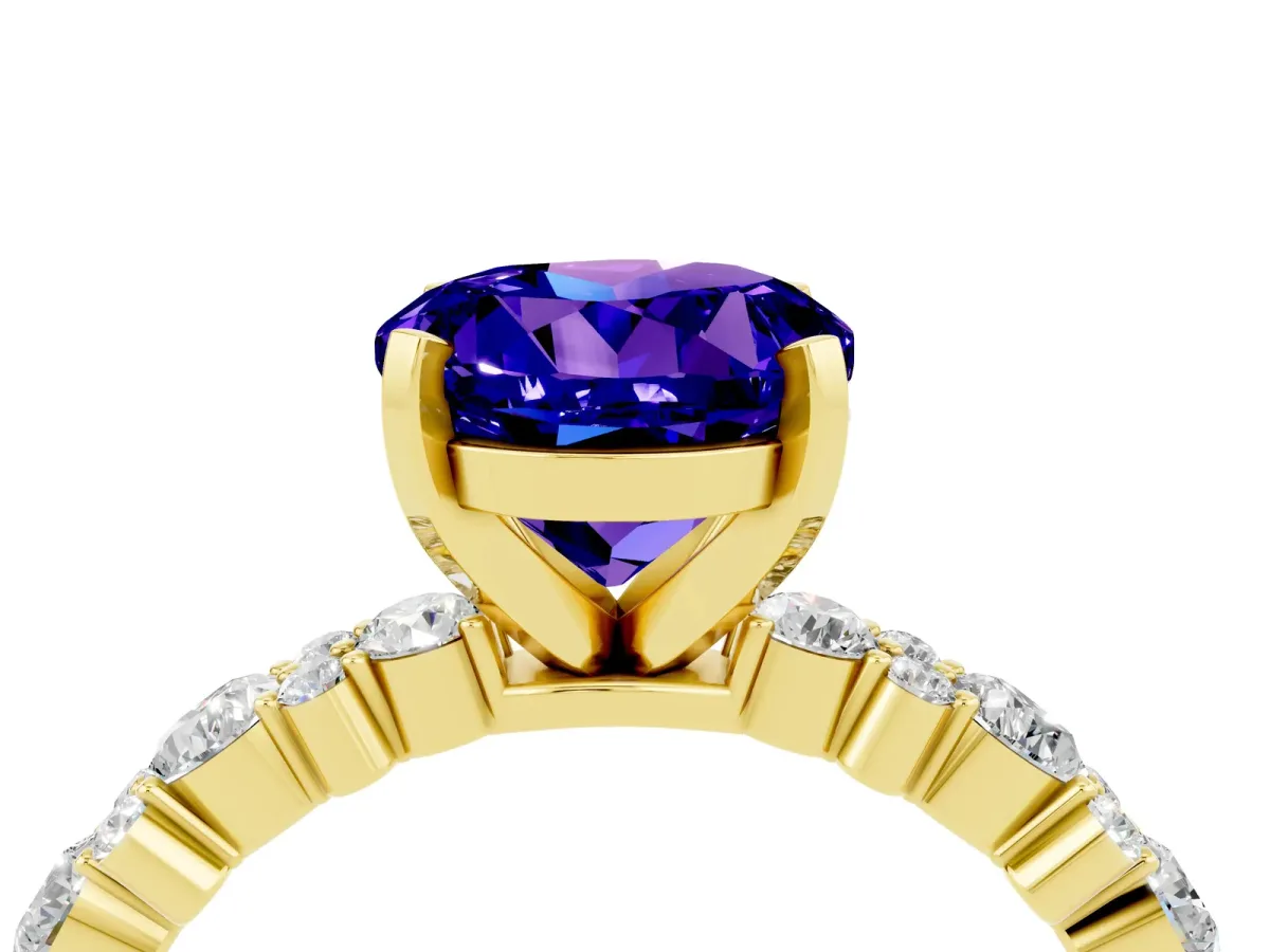 Round Cut Tanzanite Side Stone Solitaire Ring with Round and Four-Prong Setting Yellow gold