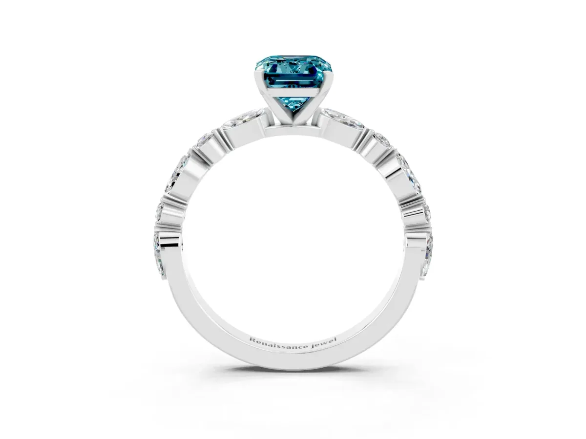 Emerald Cut Blue Topaz Ring with Marquise and Round Side Stones and Four-Prong Setting Silver